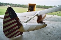 Full Scale Bowlus looking out of hanger